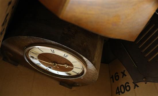 A box of assorted mantel clocks